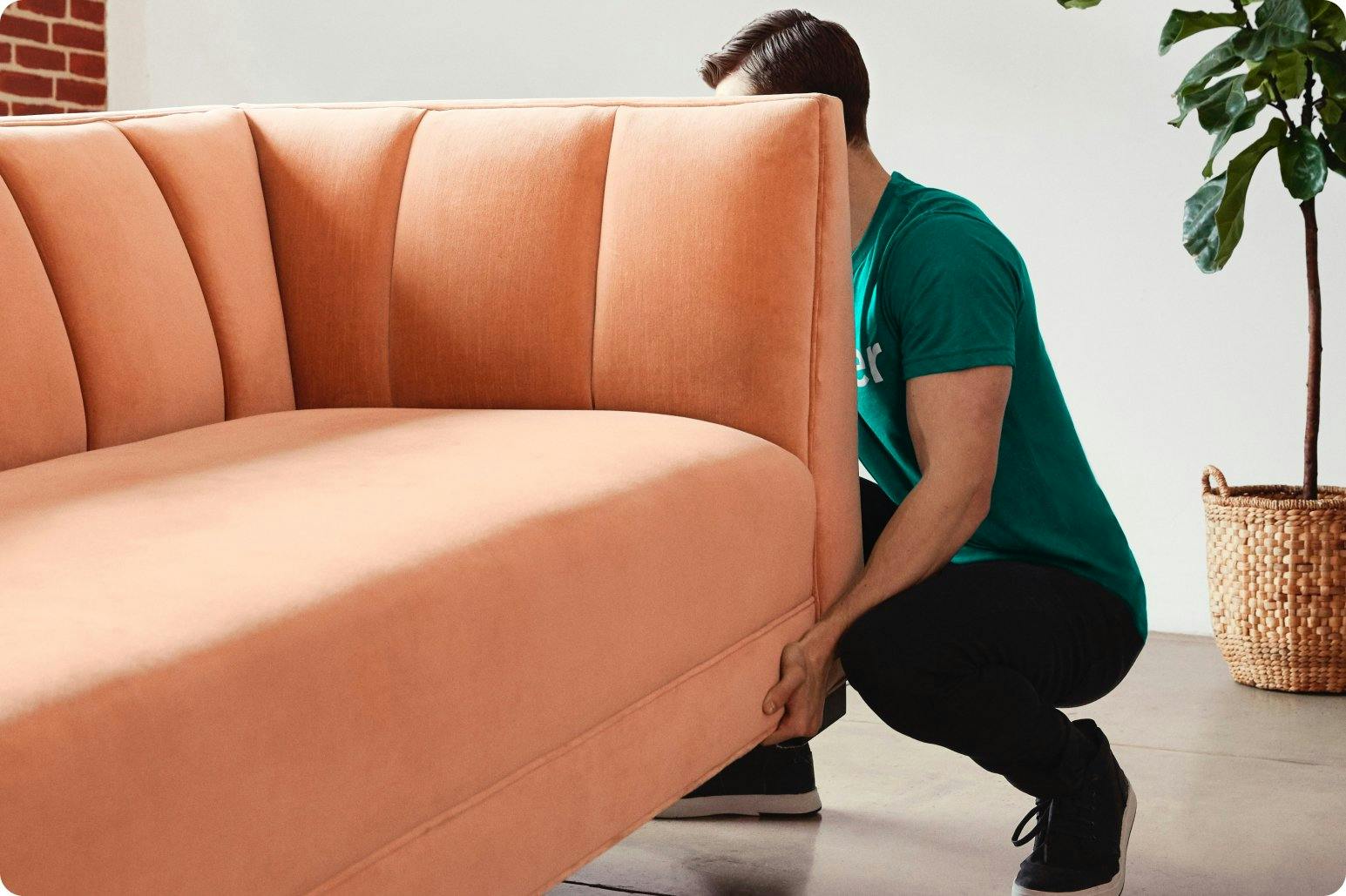 Person lifting couch